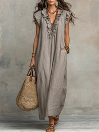 Isabella | Elegant tiered maxi dress with V-neck and ruffles