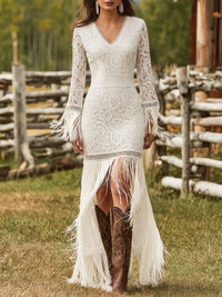 Louisa | Elegant long-sleeve maxi dress with V-neck and boho tassels